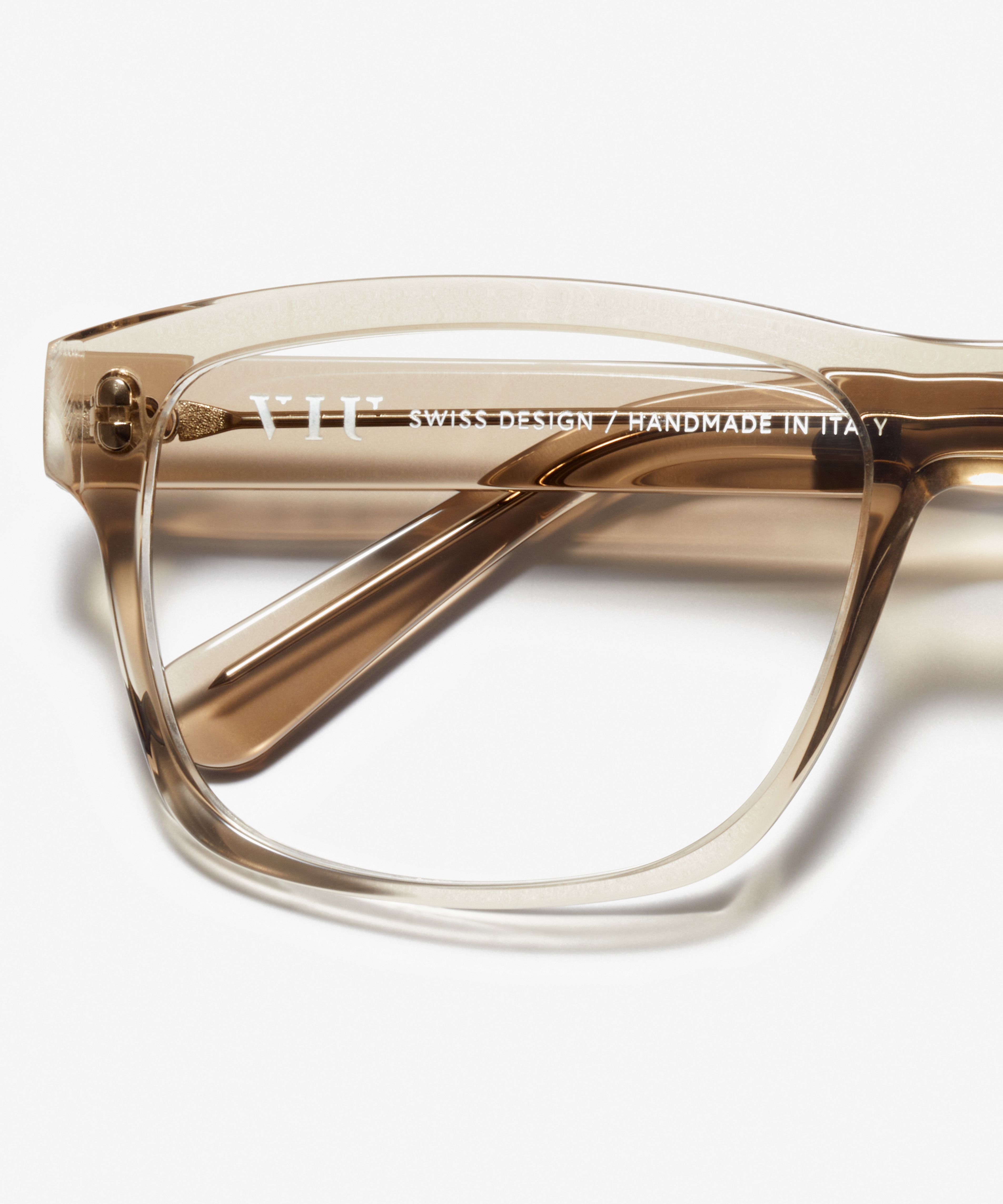 Detail image of the frame The Marvelous in colour Stone Grey Transparent and size Wide