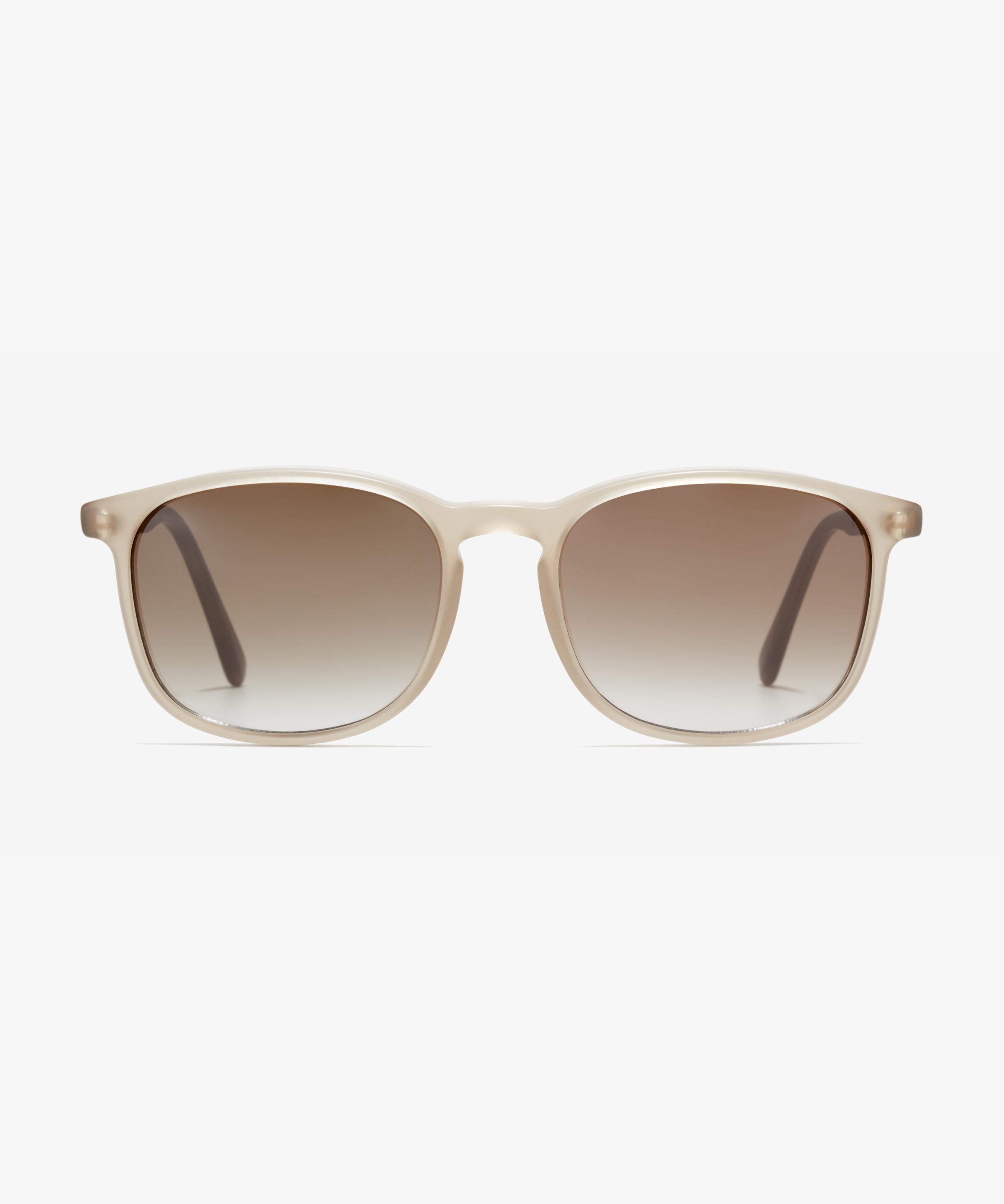 Front image of the sunglasses The Polished in colour Stone Grey Transparent and size Wide