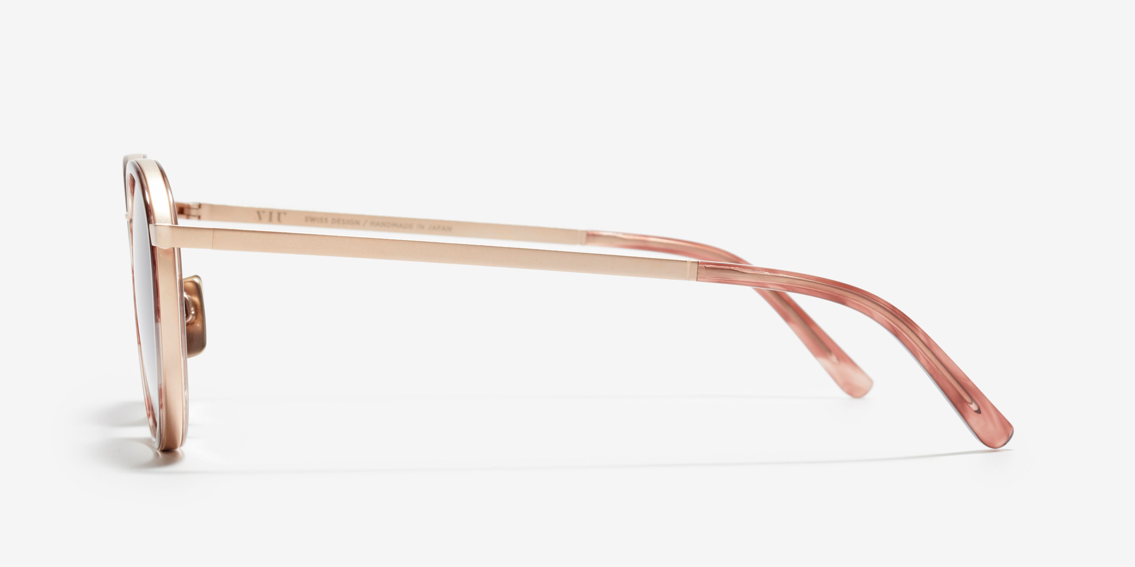Side image of the sunglasses The Voyager Ace in colour Rose Gold / Rose Quartz and size Medium