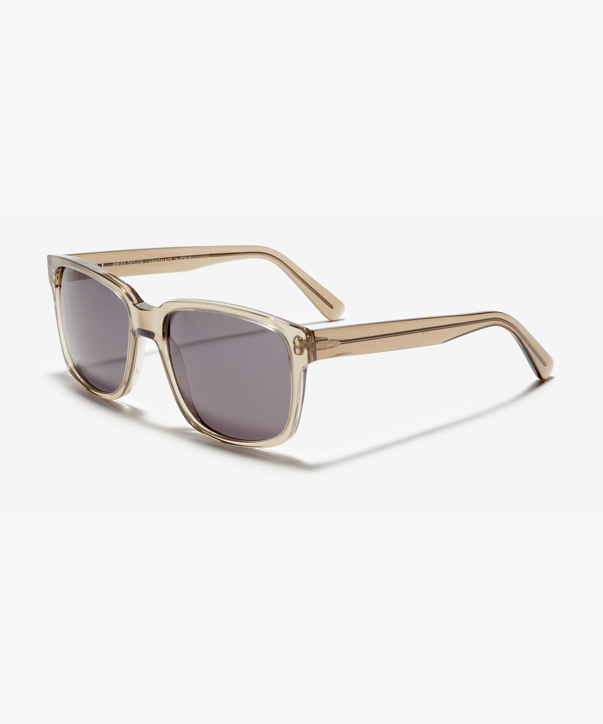 Schräg-Bild der Sonnenbrille The Rational in Farbe Stone Grey Transparent und Grösse Breit