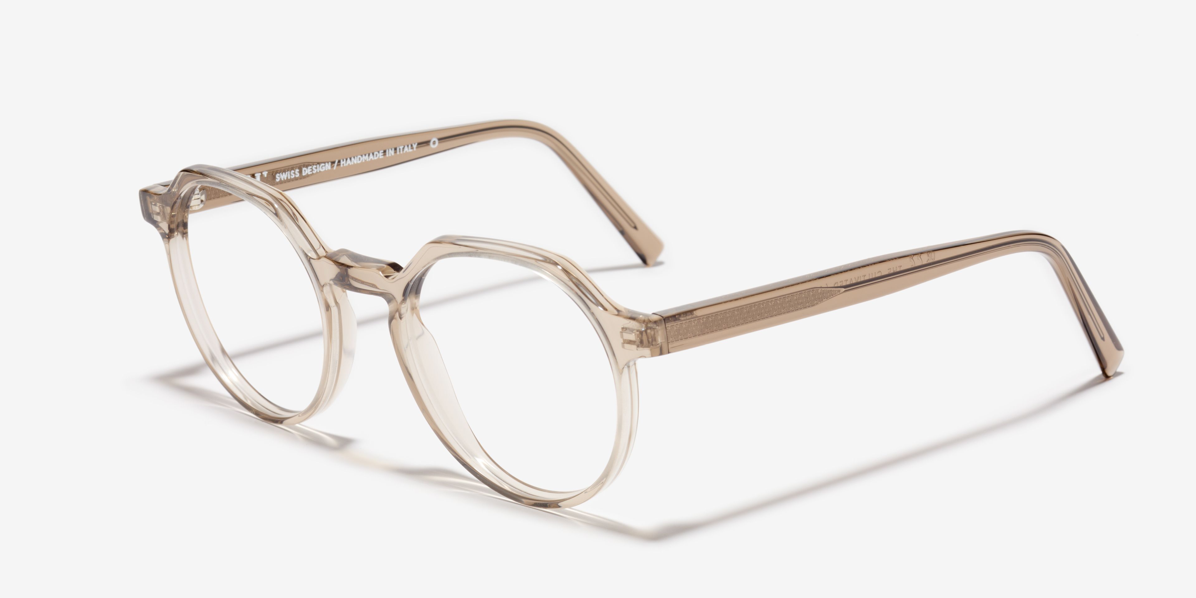 Angle image of the frame The Cultivated in colour Stone Grey Transparent and size Medium