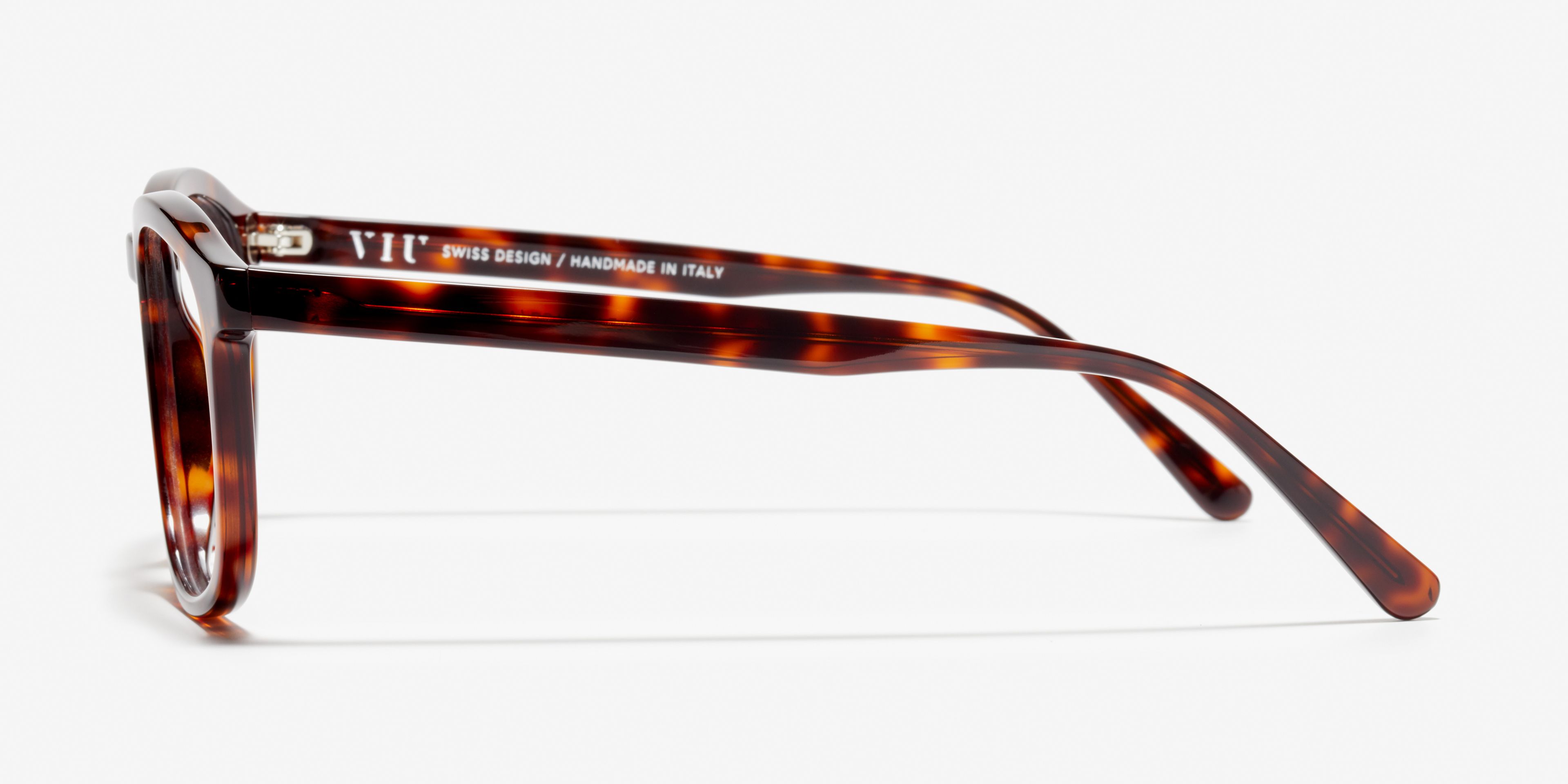 Side image of the frame The Distinct in colour Tortoise and size Wide
