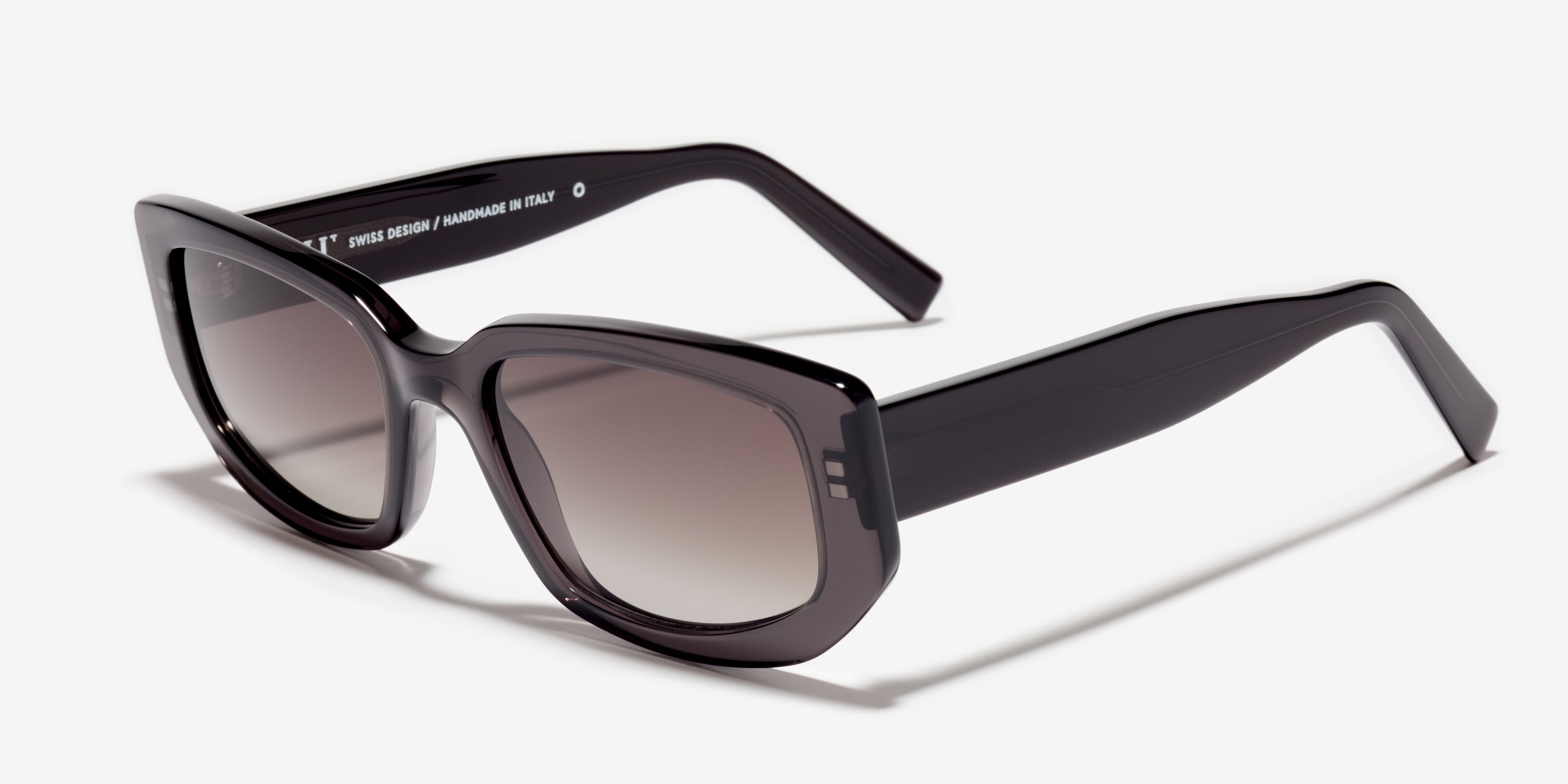 Schräg-Bild der Sonnenbrille The Premiere in Farbe Black Transparent und Größe Breit