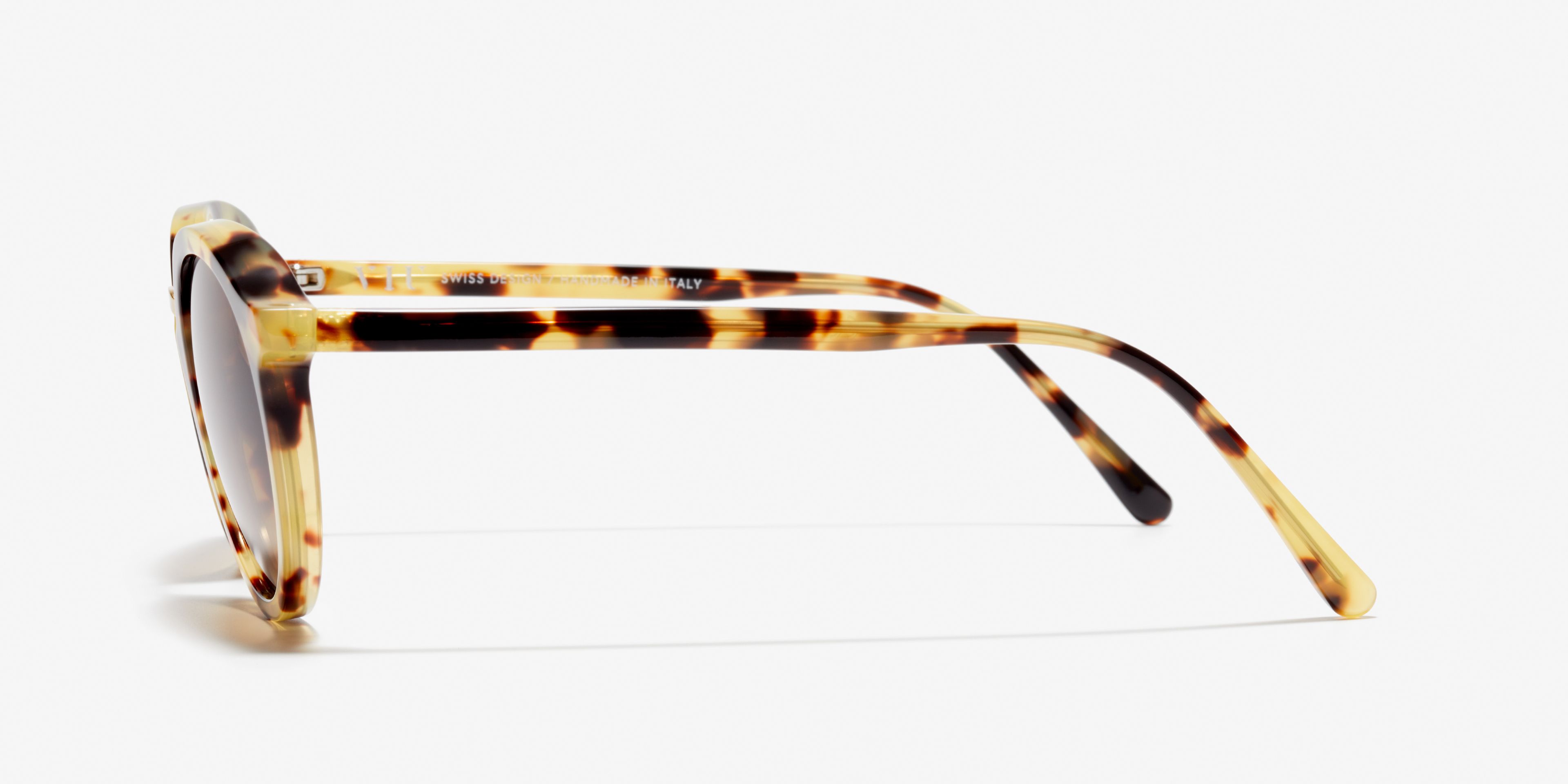 Side image of the sunglasses The Author in colour Gold Tortoise and size Medium