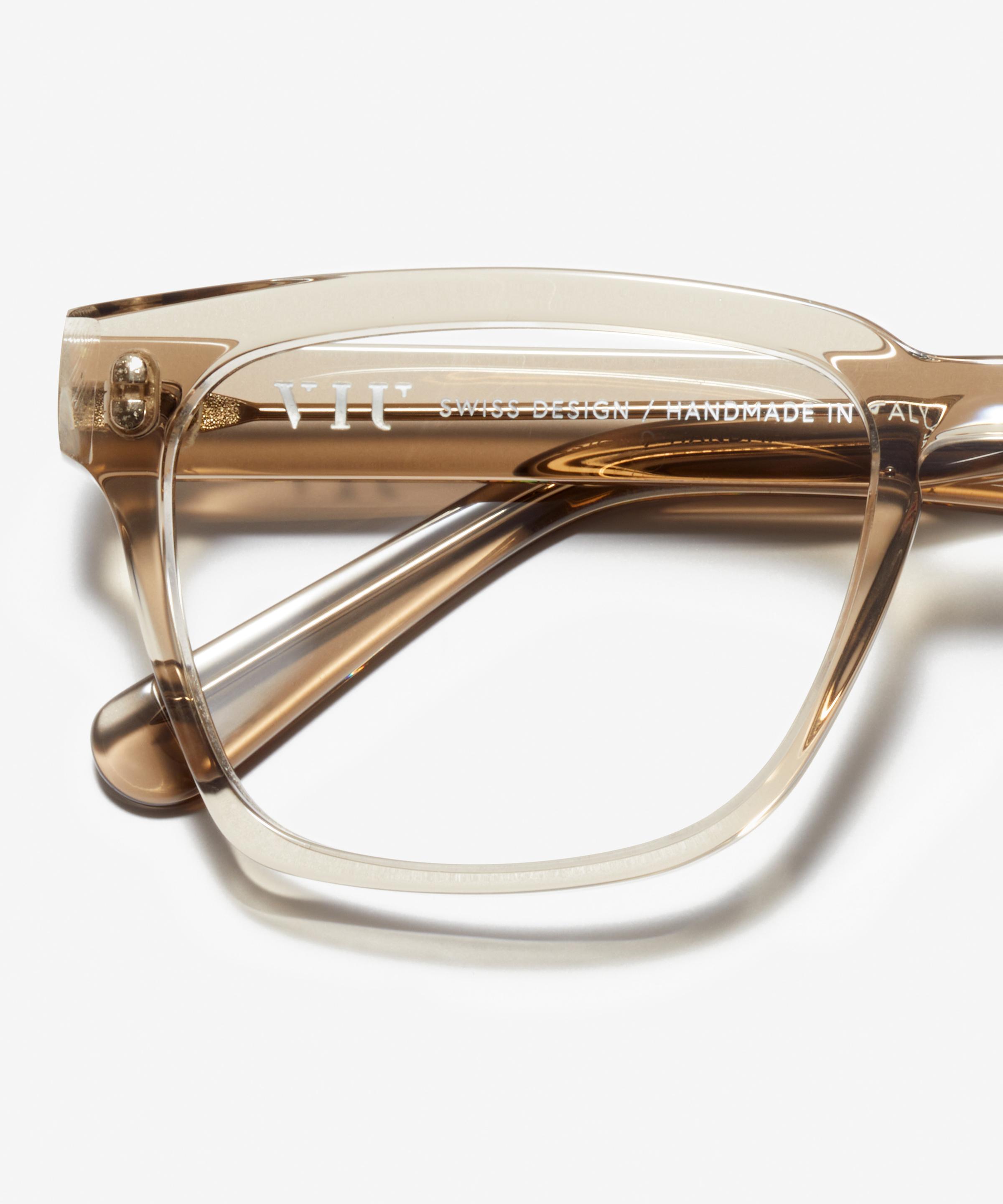 Detail image of the frame The Handsome in colour Stone Grey Transparent and size Wide