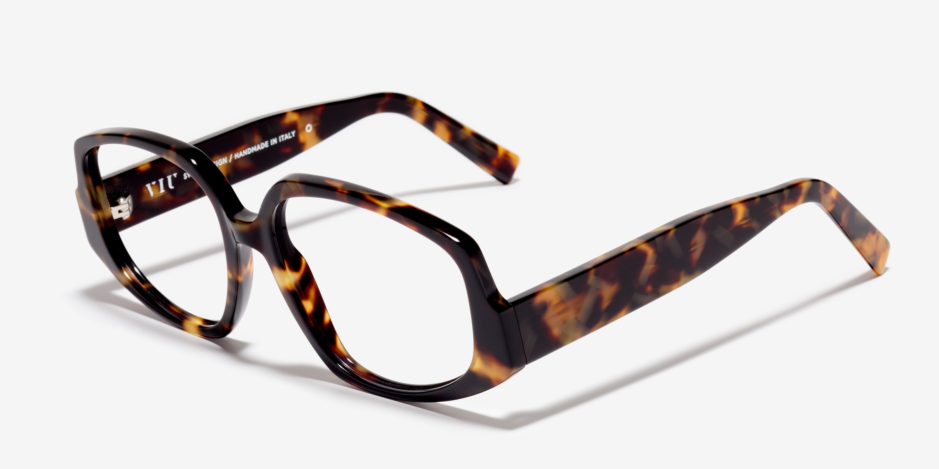 Angle image of the frame The Ecstatic in colour Amber Tortoise and size Wide