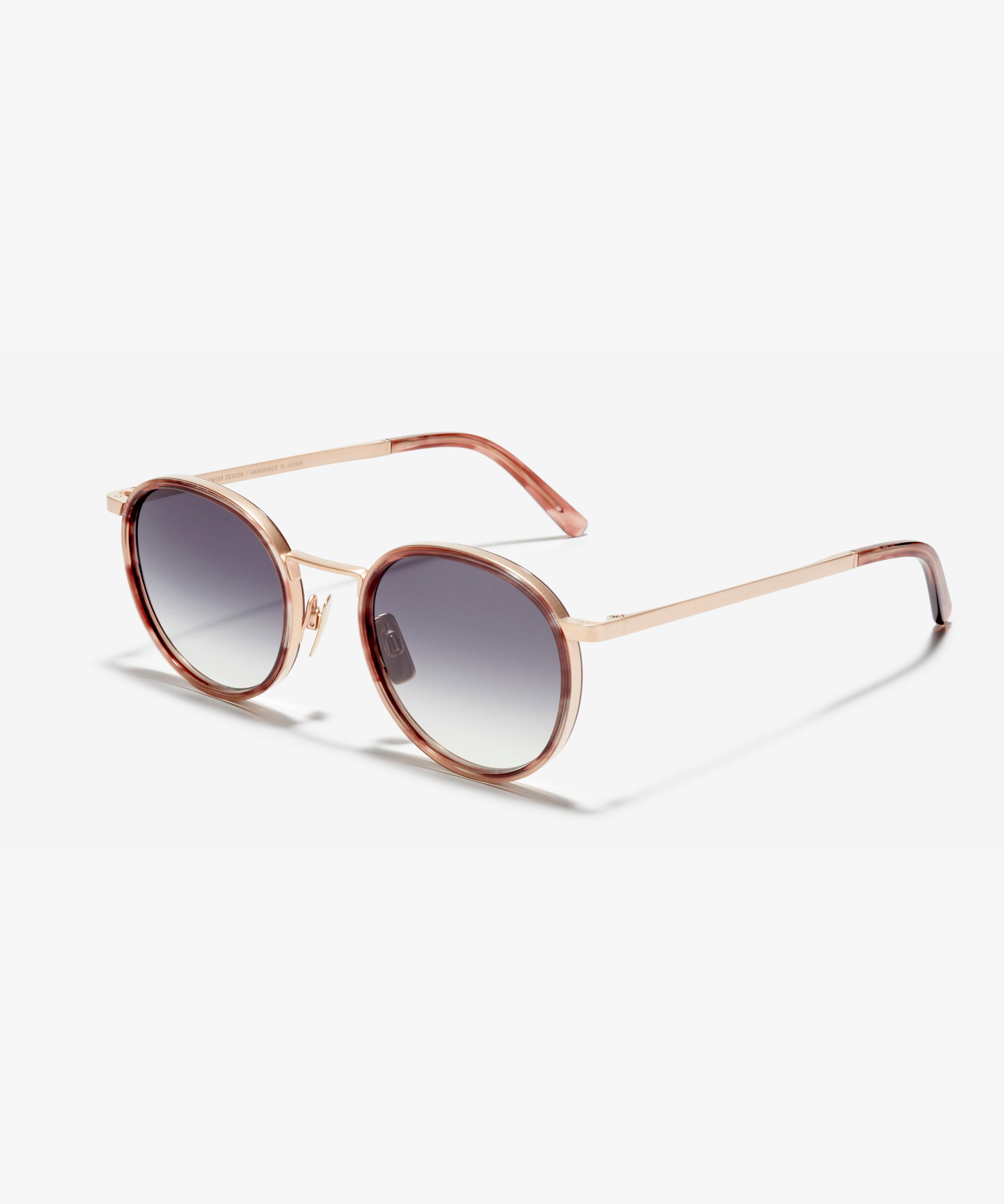 Angle image of the sunglasses The Voyager Ace in colour Rose Gold / Rose Quartz and size Medium