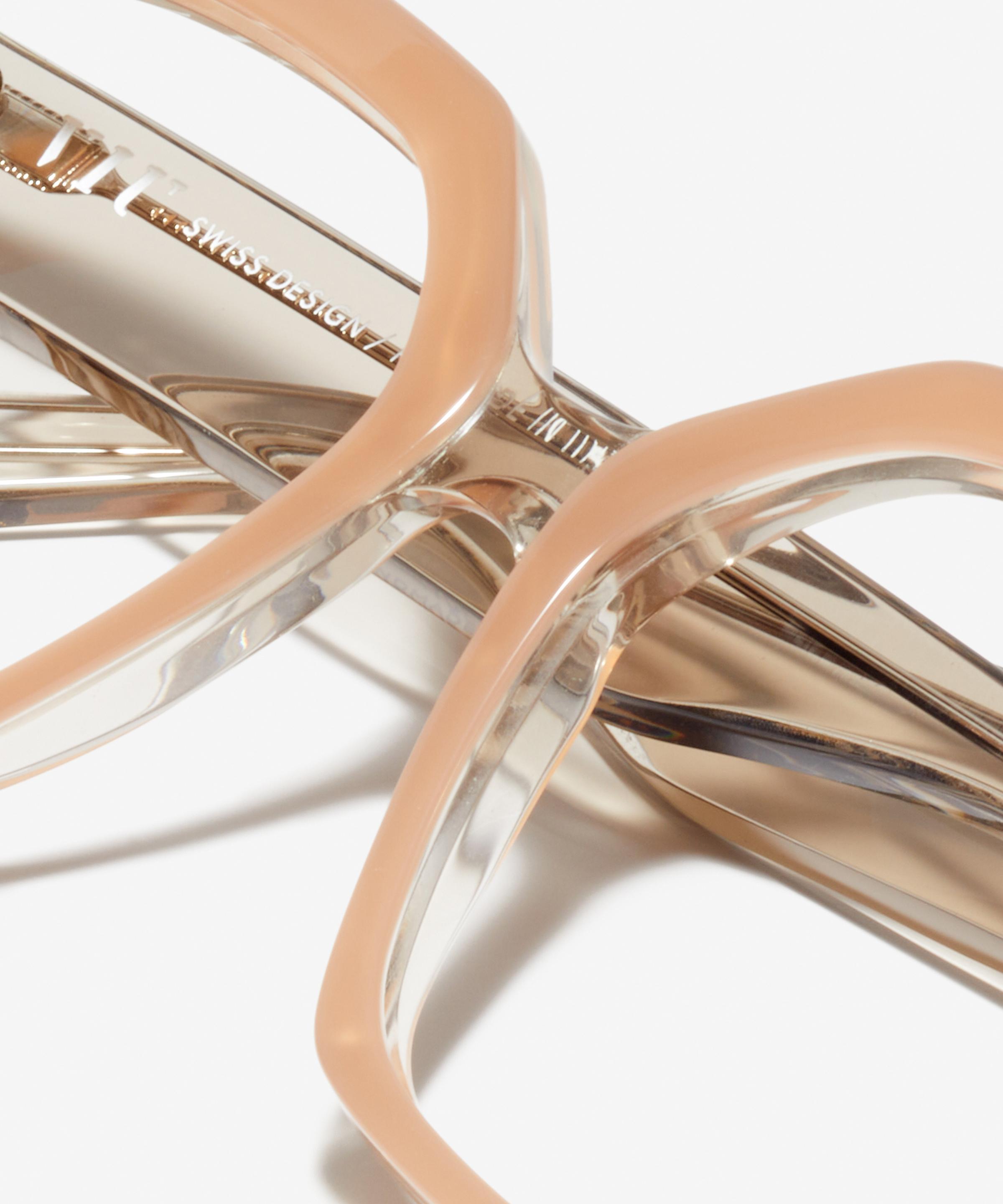 Detail image of the frame The Royal II in colour Nude / Transparent and size Wide