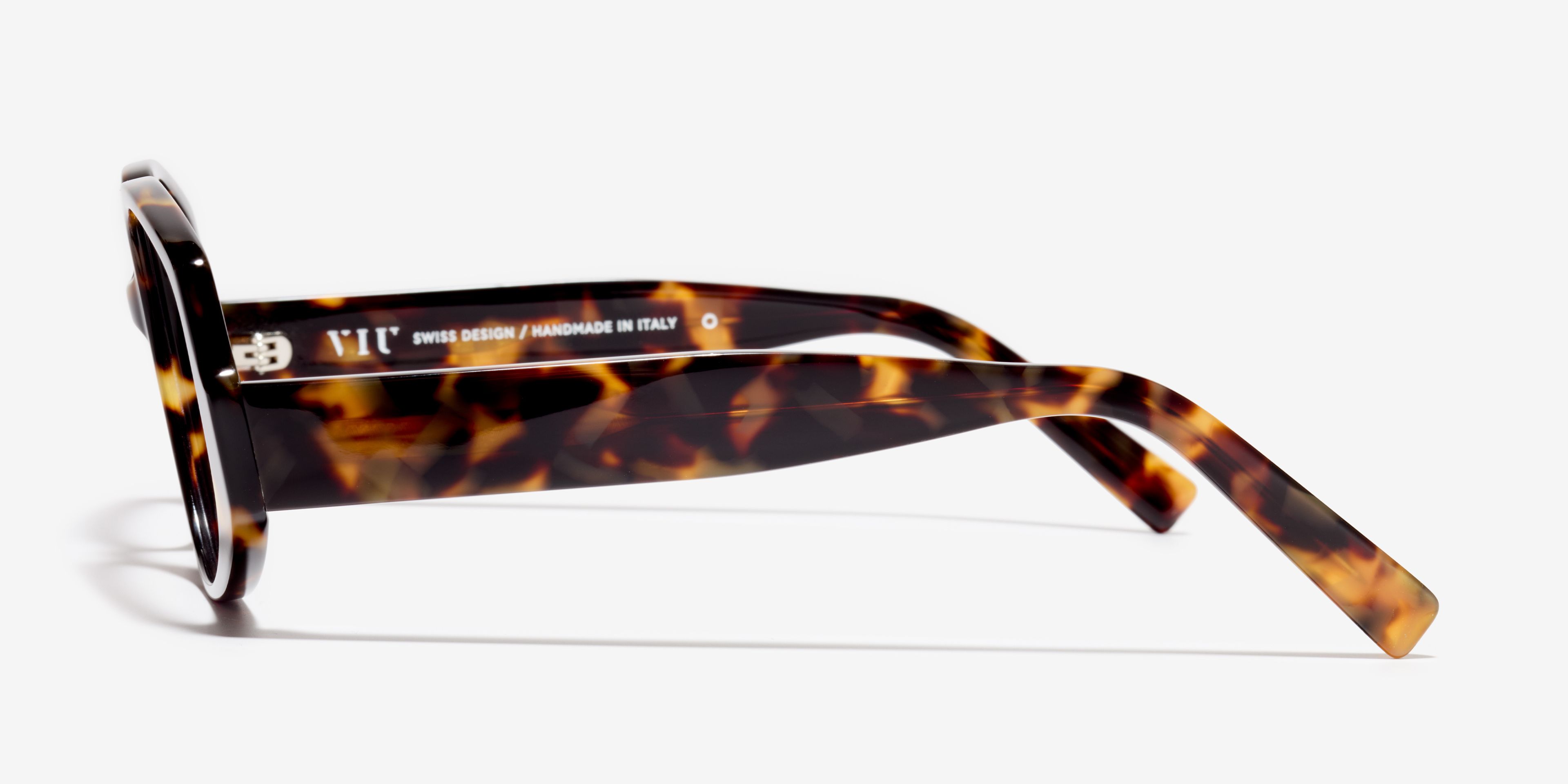 Side image of the frame The Ecstatic in colour Amber Tortoise and size Wide